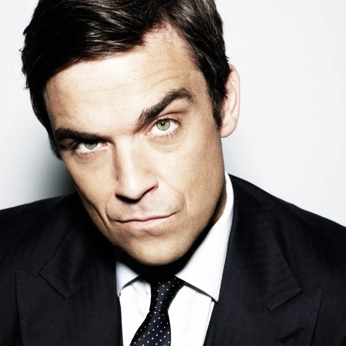 ROBBIE WILLIAMS : L'ICONE DE LA POP