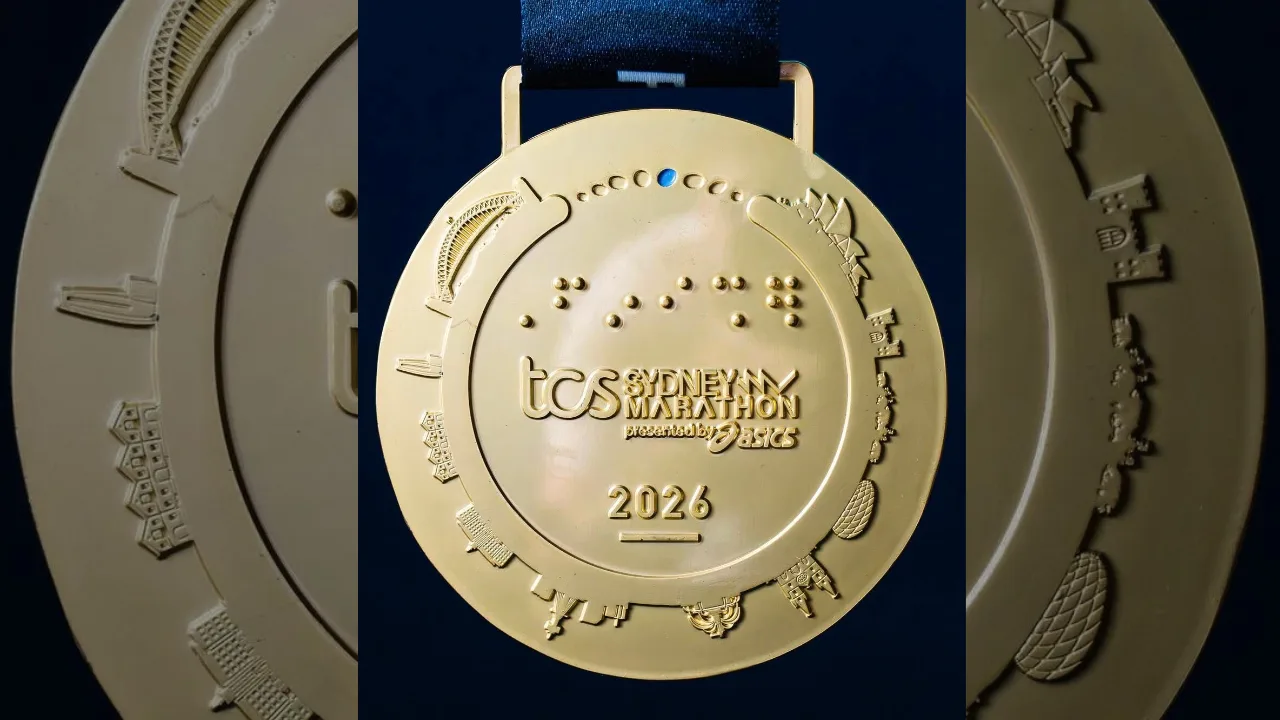 LE MARATHON DE SYDNEY A GRAVÉ PAR ERREUR UN STADE ALLEMAND SUR SA MÉDAILLE