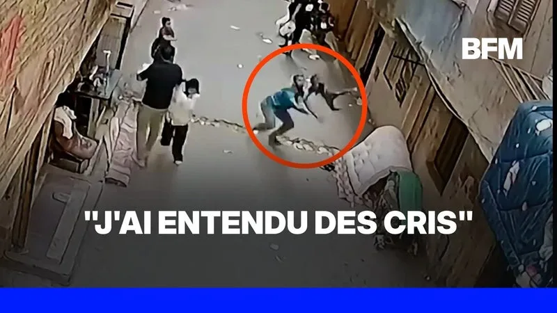 UN HOMME SAUVE UN ENFANT TOMBANT D’UN BALCON EN ÉGYPTE